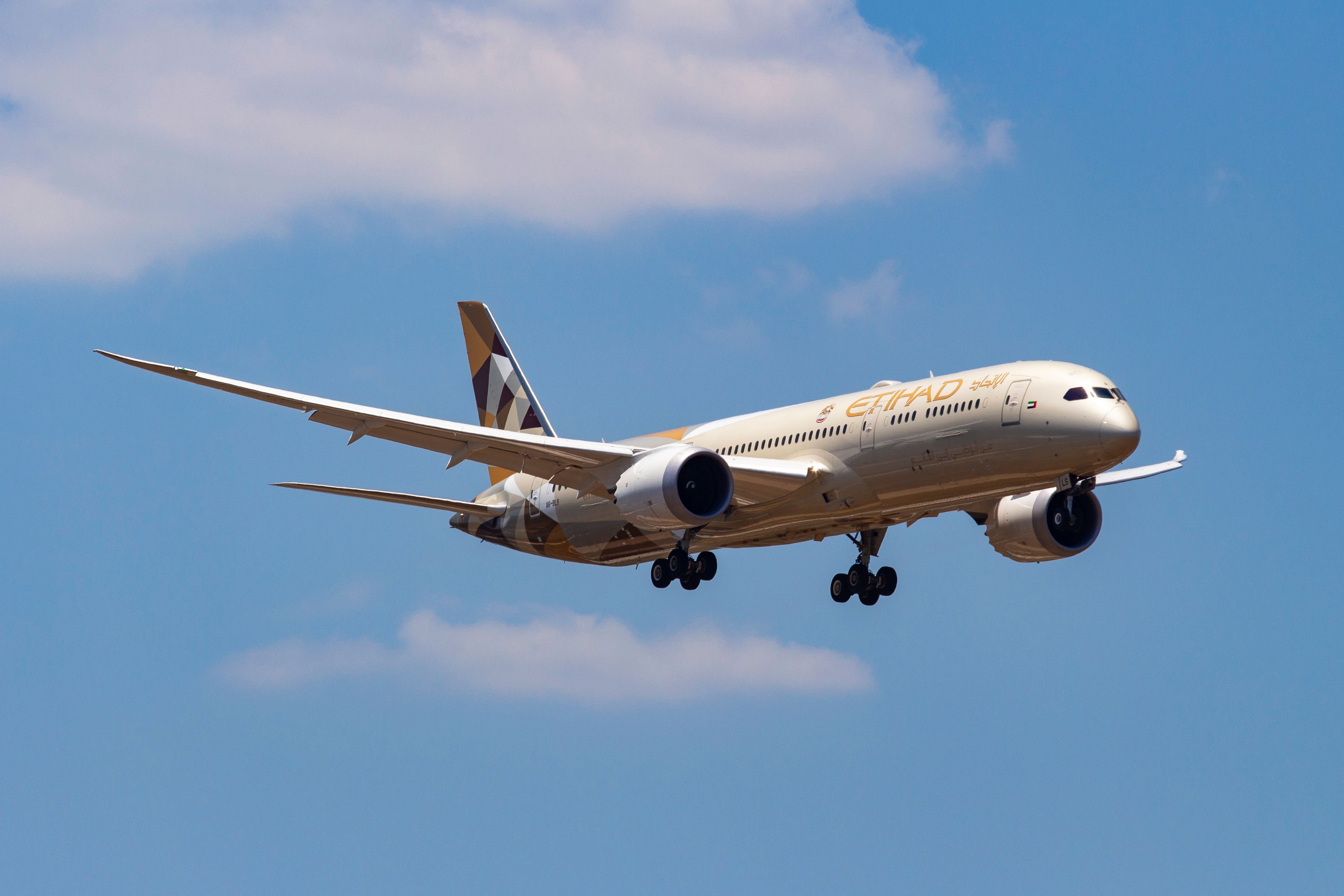 Etihad Airways Boeing 787-9 landign at Athens Airport ATH shutterstock_1455775964