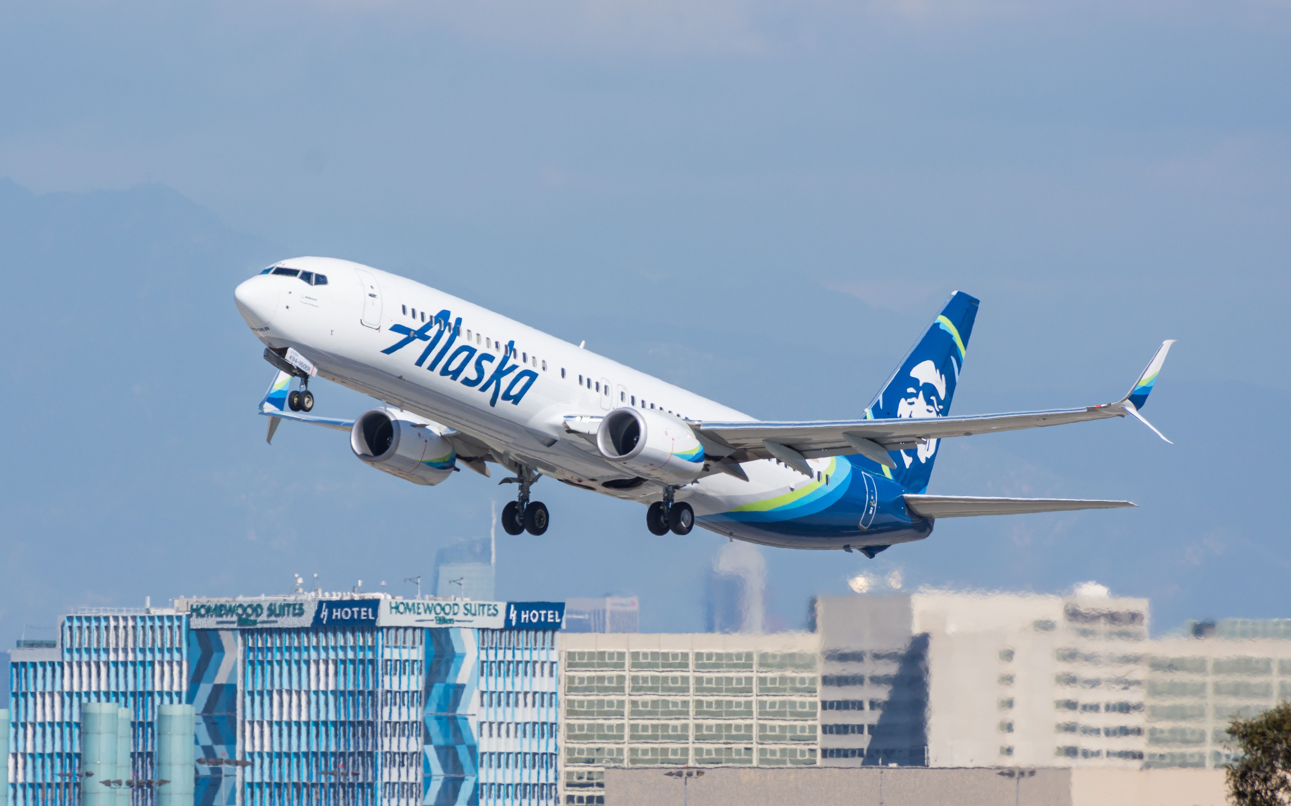 An Alaska Airlines Boeing 737-900 just after take off.