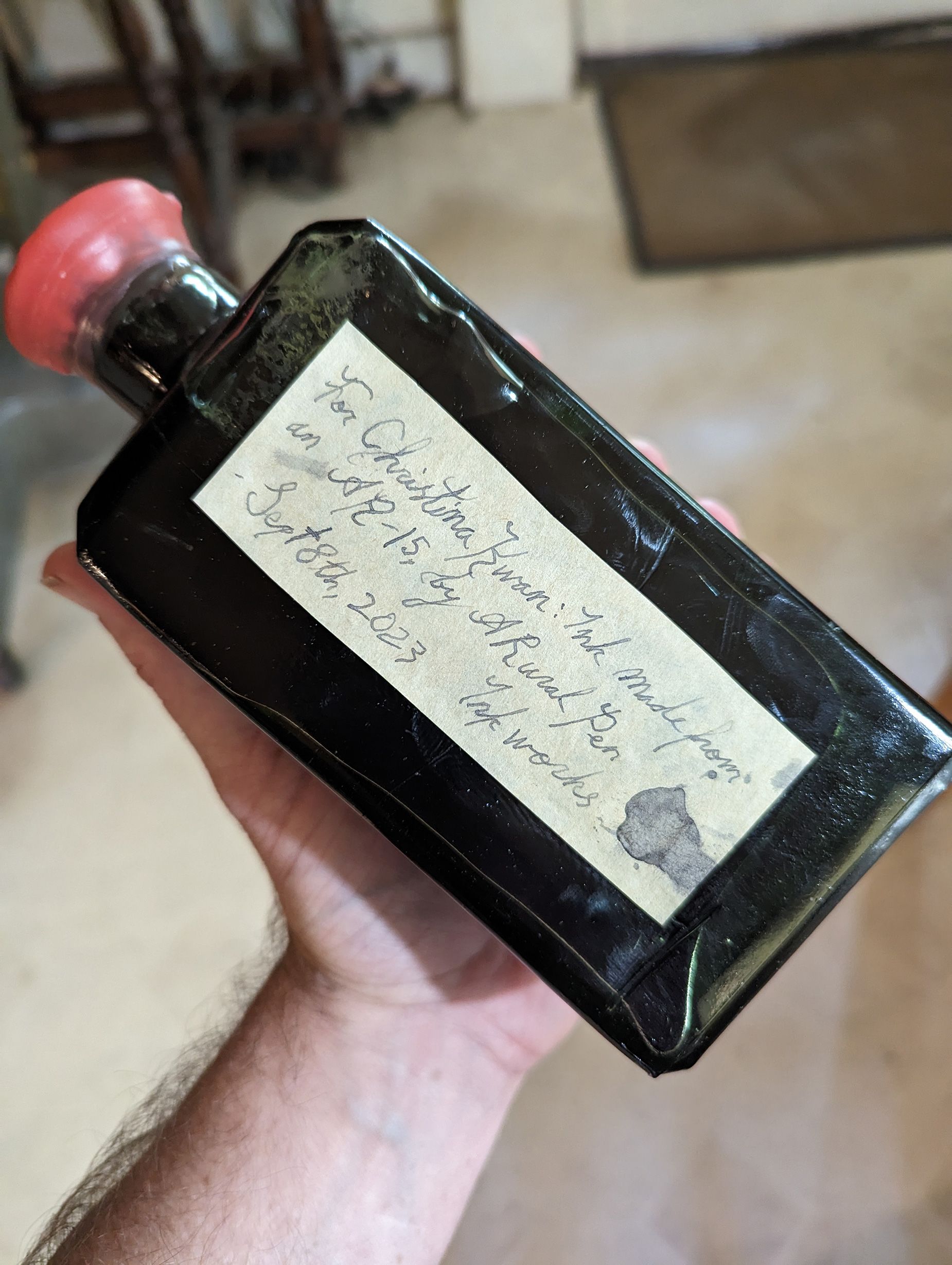 Little's large batch of ink for the artist Christina Kwan, who has been experimenting with his materials. It was made from an AR-15.