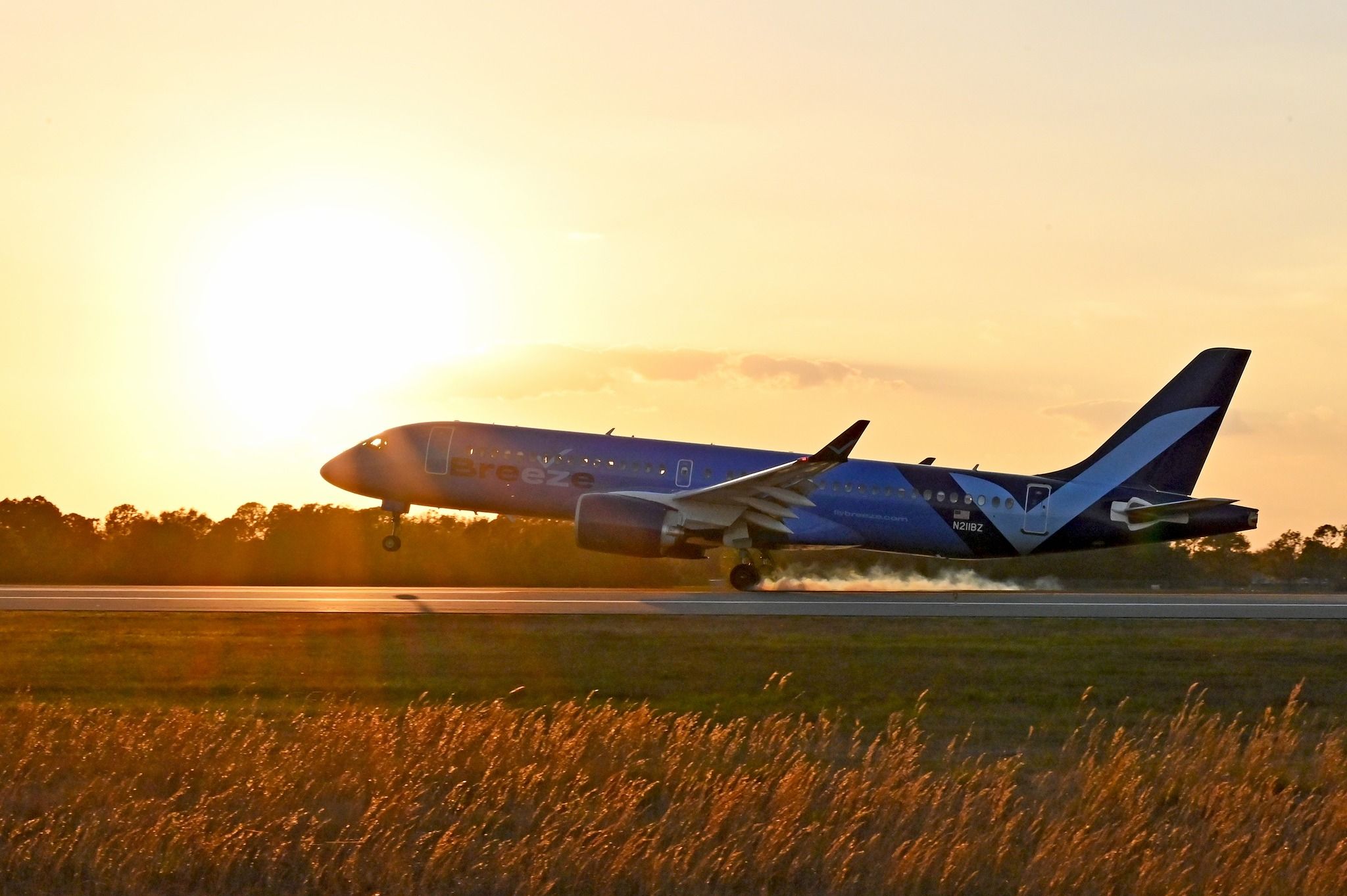 Breeze Airways Airbus A220-300 departing from Orlando International Airport.