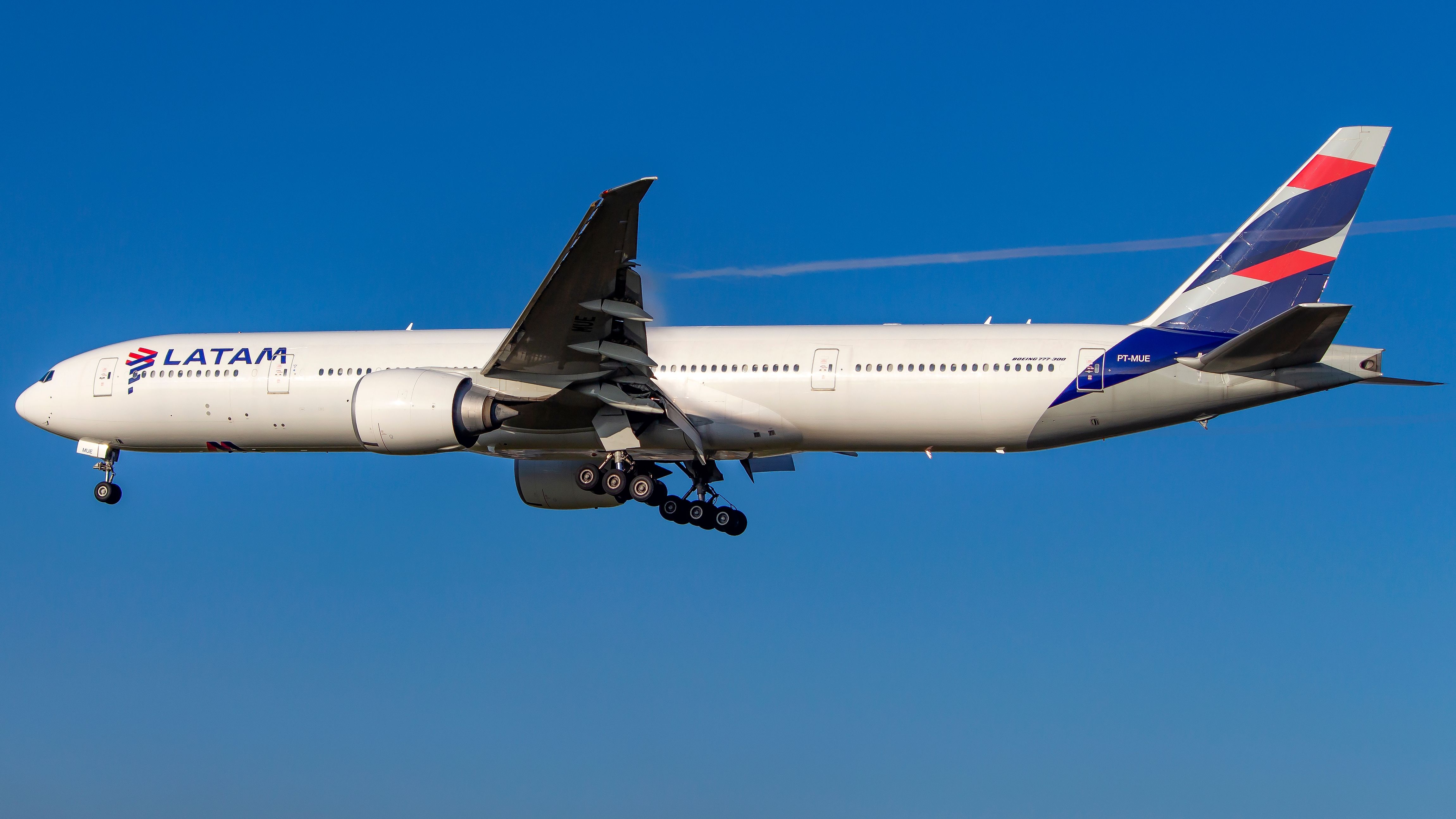 LATAM Airlines Boeing 777-300ER landing at LHR shutterstock_2109071732