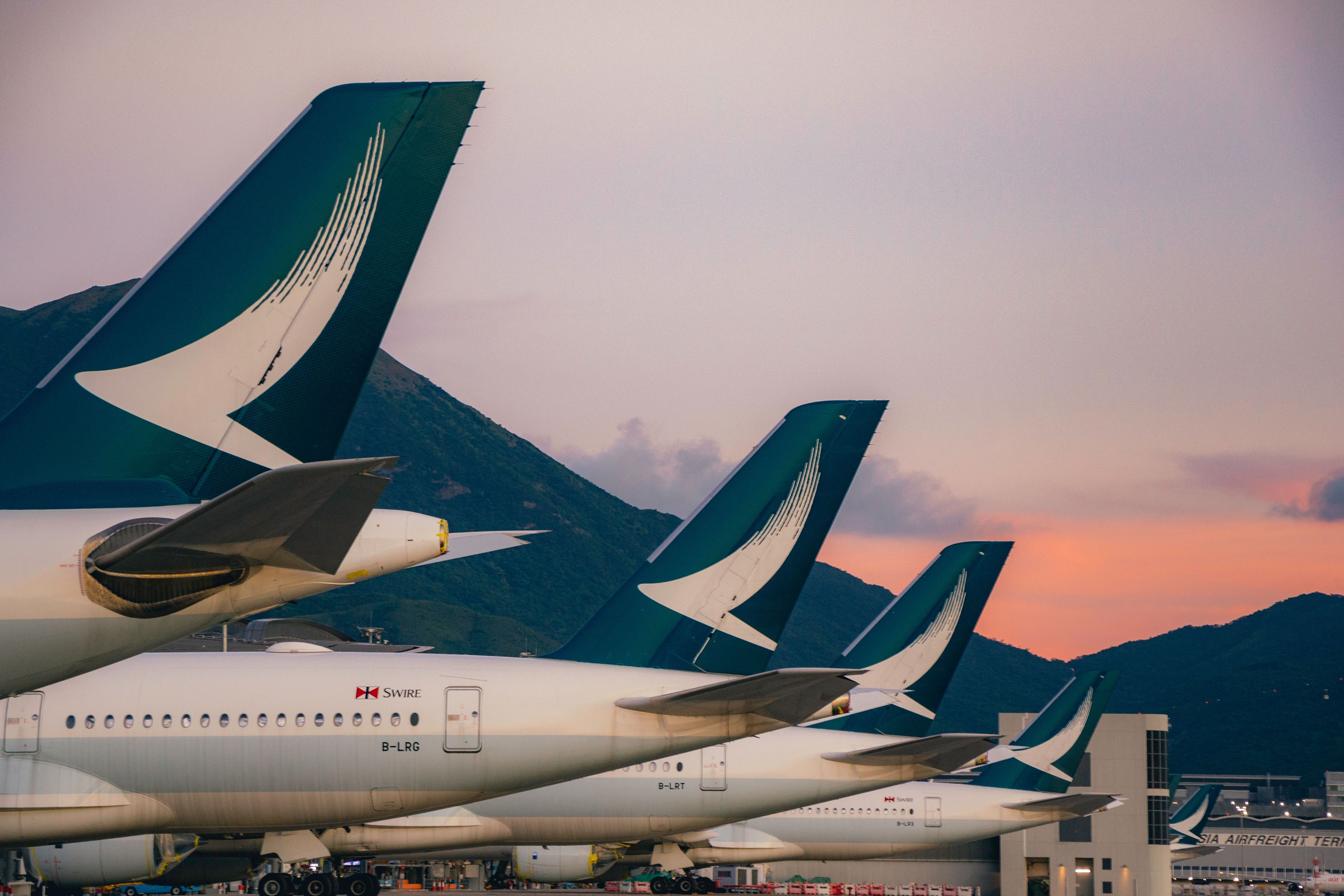 Cathay Pacific aircraft parked at HKG shutterstock_2048211518