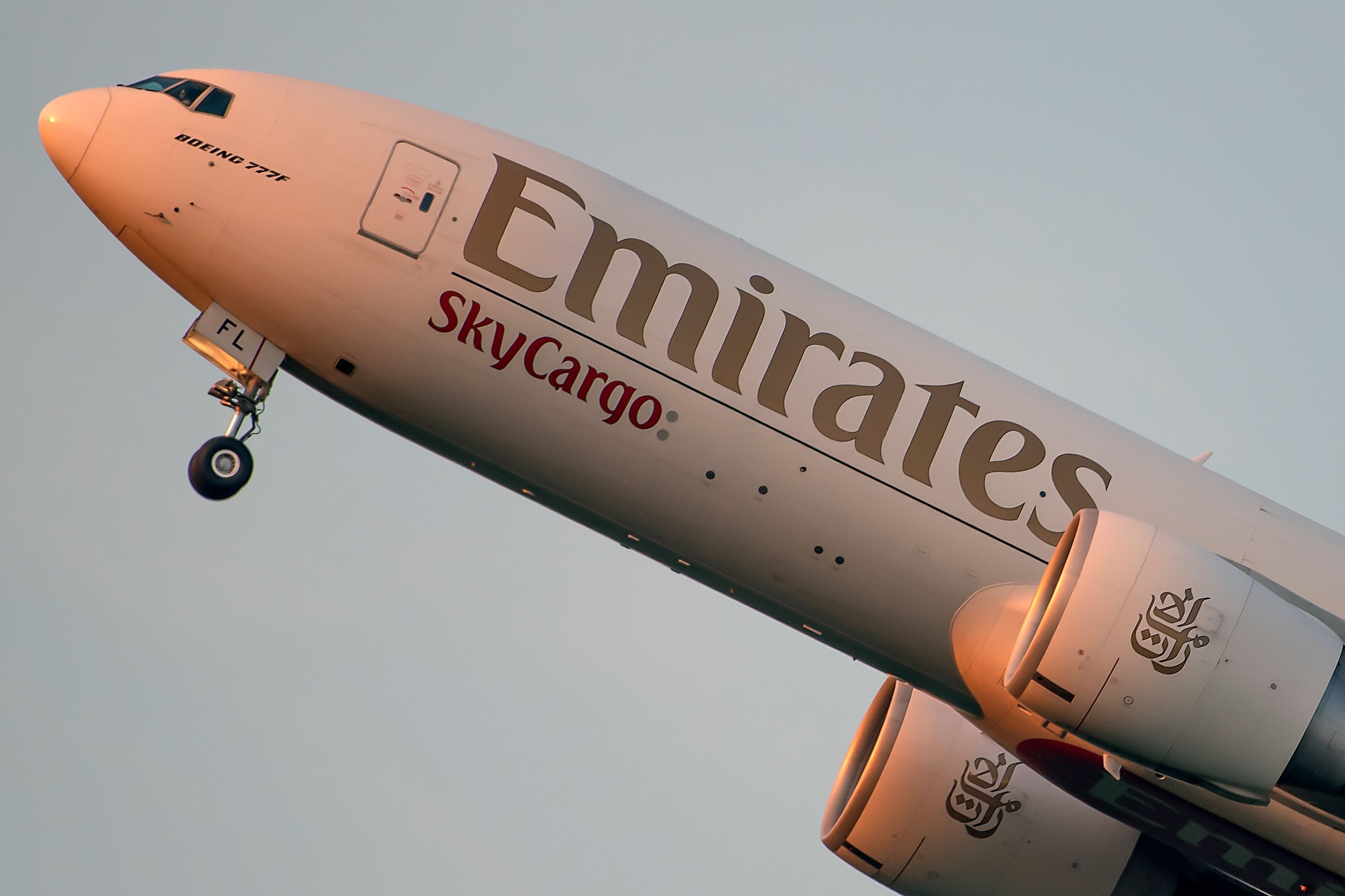 Emirates SkyCargo Boeing 777F departing Frankfurt Airport FRA shutterstock_2186106379