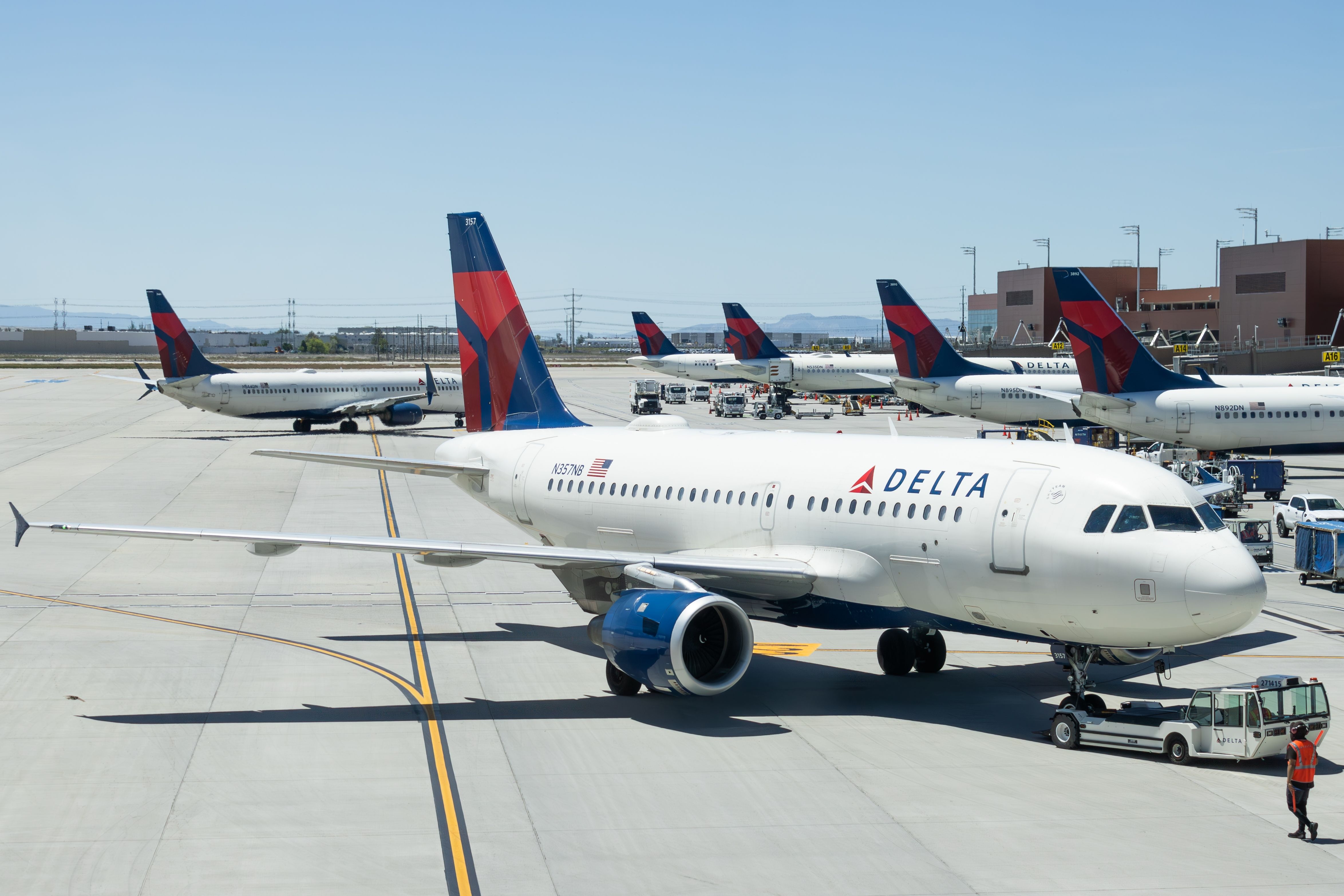 Delta Air Lines Airbus A319 being pushed back at Salt Lake City International Airport.
