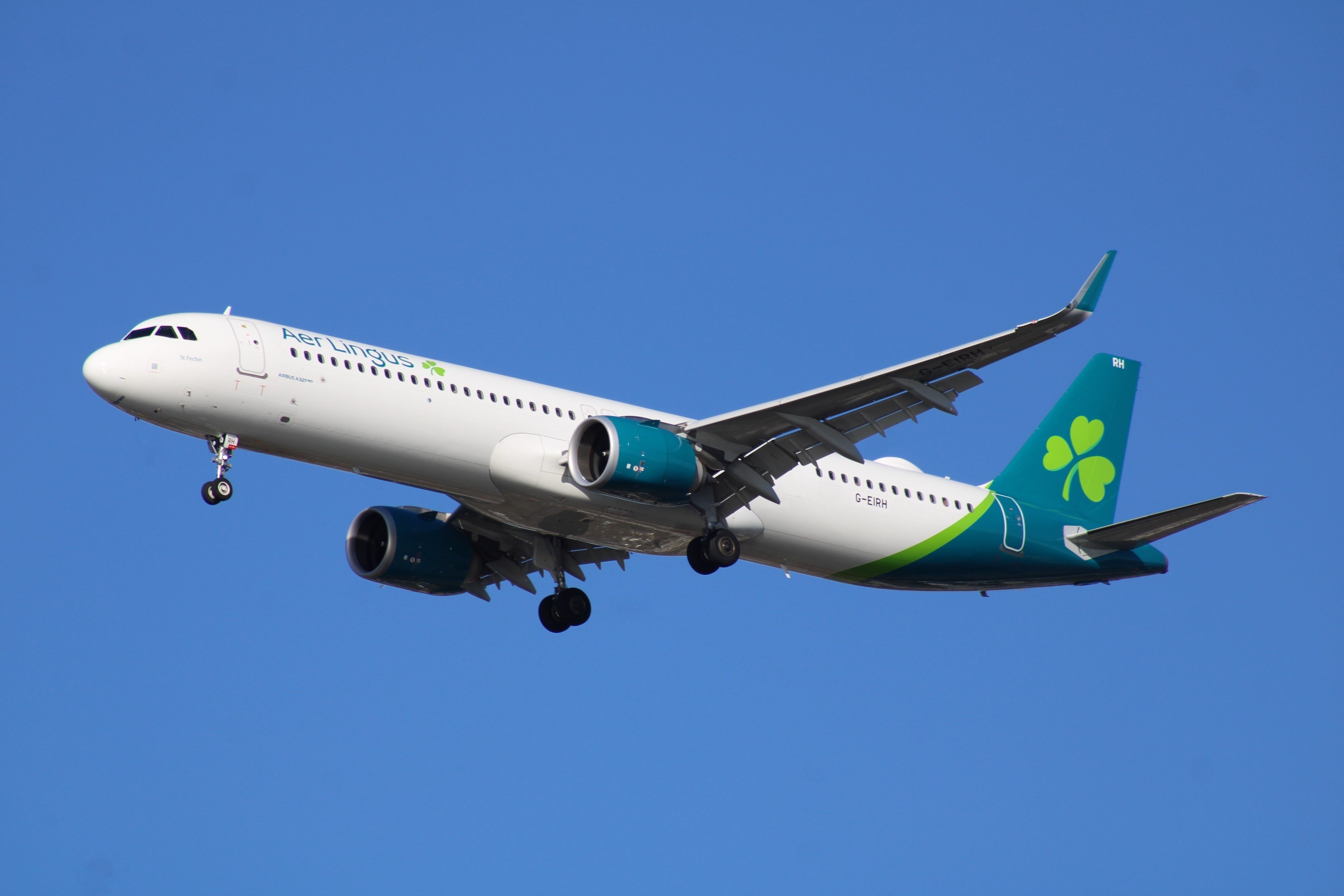 An Aer Lingus Airbus A321LR flying in the sky. 