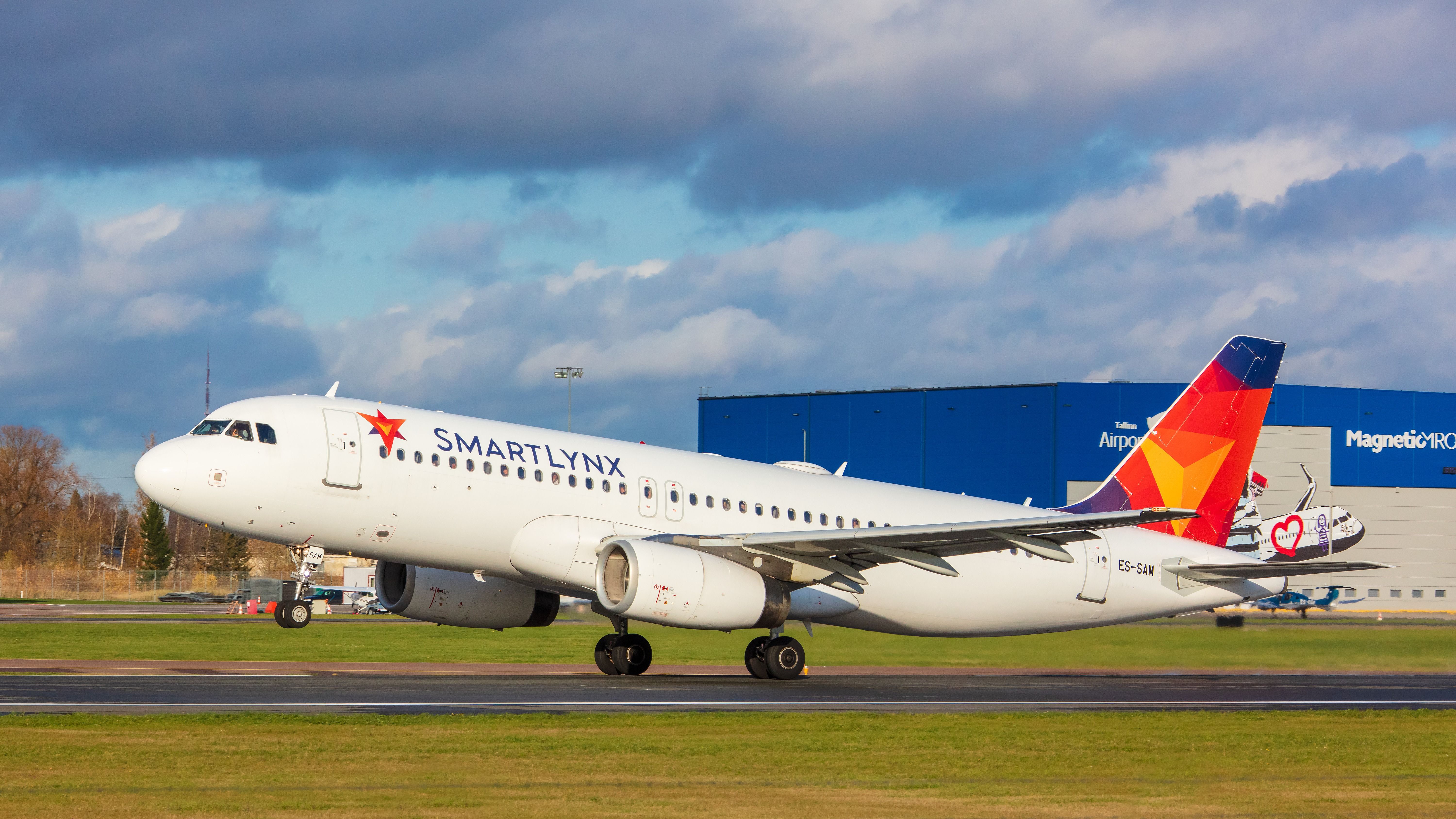 A SmartLynx Airlines Airbus A320 taking off