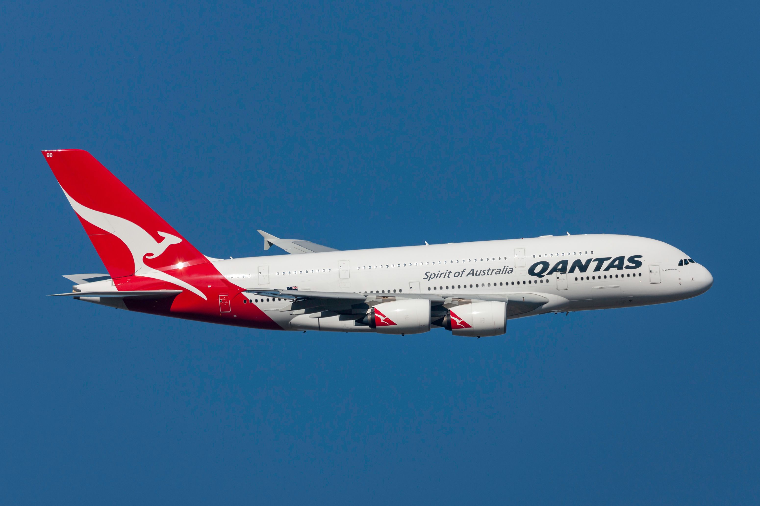 A Qantas Airbus A380 flying in the sky.