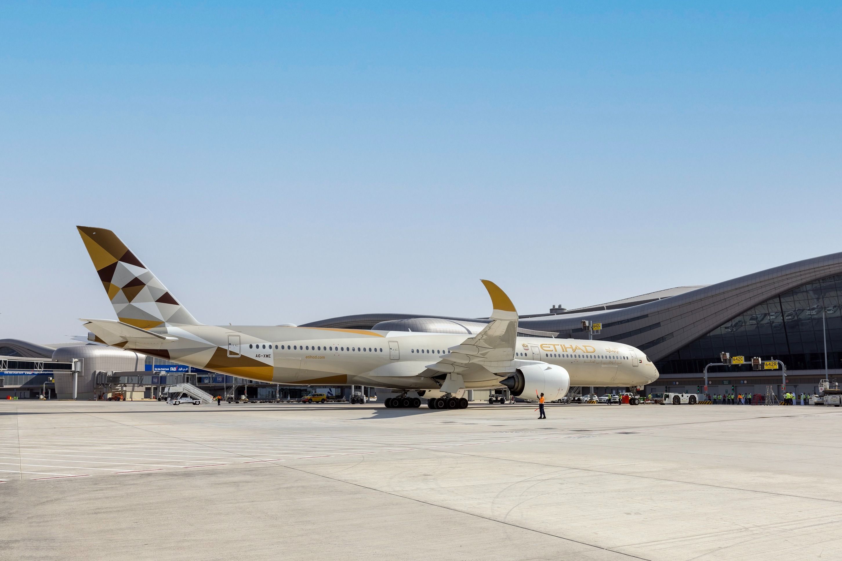 An Etihad Airways aircraft parked on the apron at Abu Dhabi International Airport.