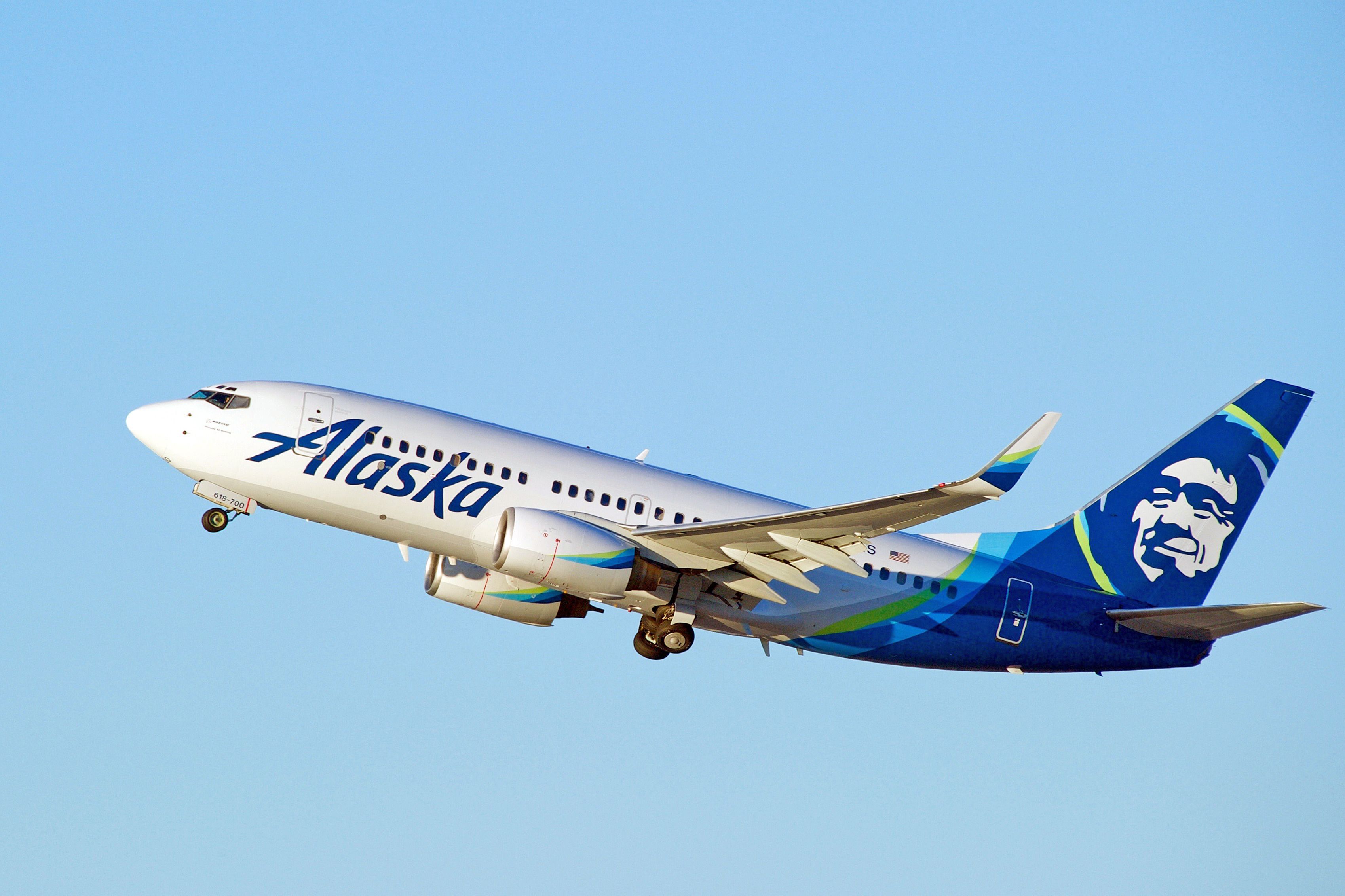 Alaska Airlines Boeing 737-790(WL) aircraft is airborne as it departs Los Angeles International Airport, Los Angeles, California USA