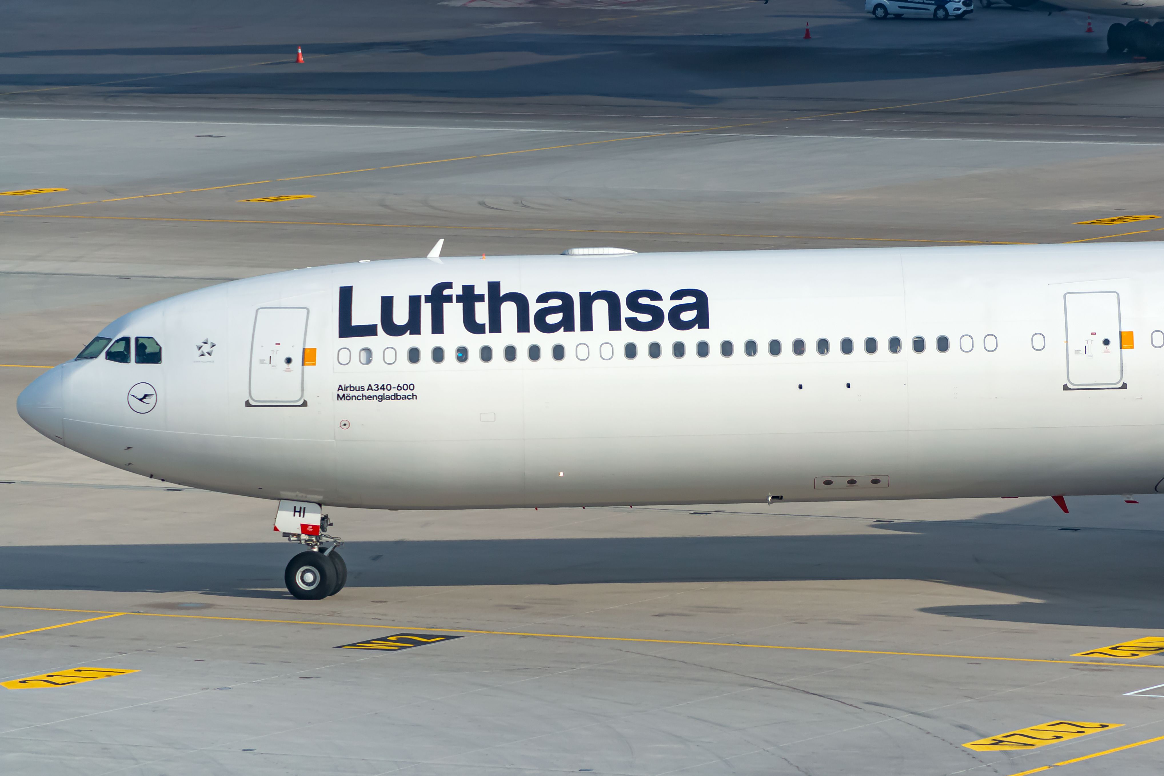 A Lufthansa Airbus A340-600 on the apron at Munich Airport.