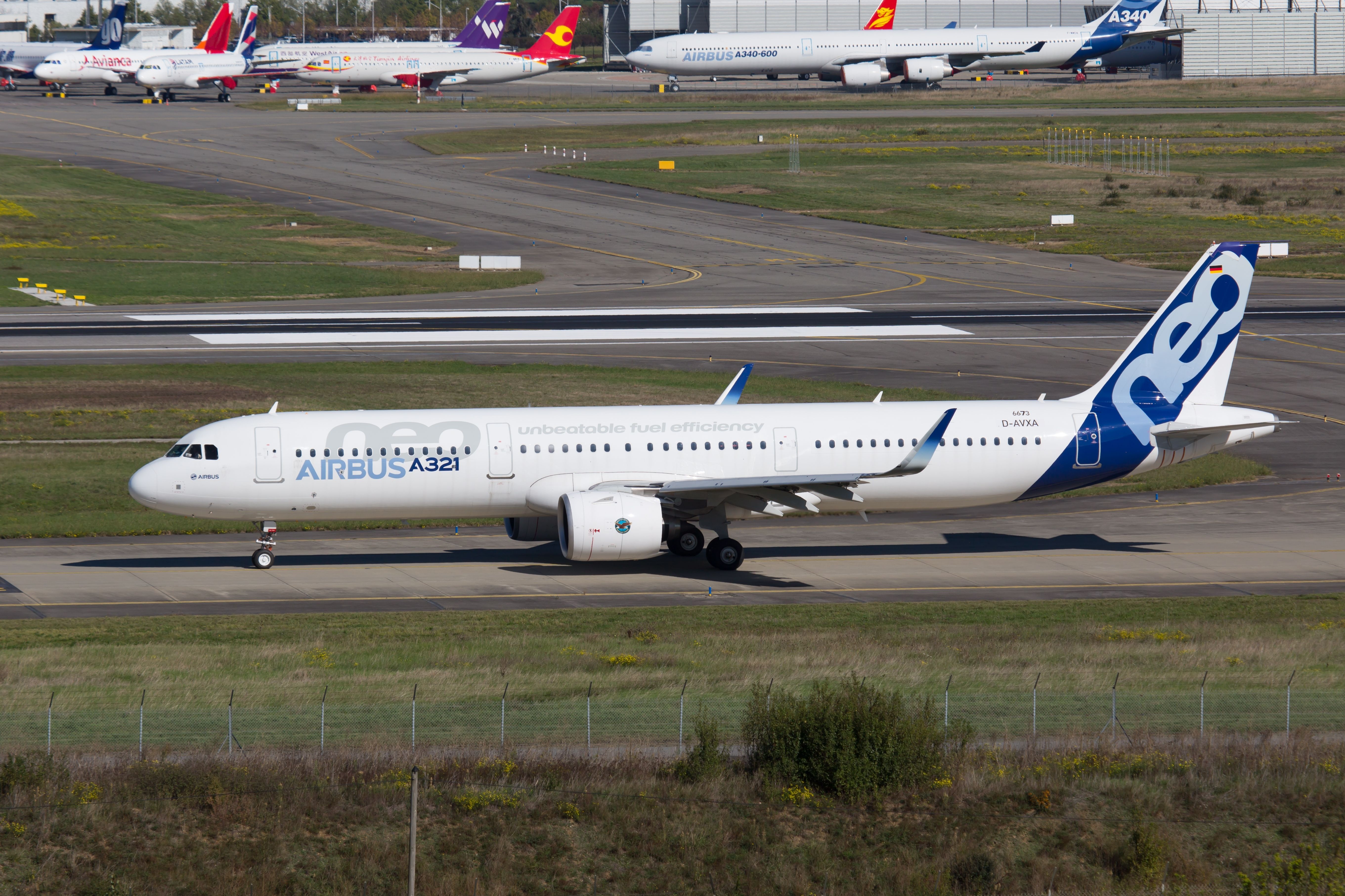 Airbus A321neo equipped with the PW1100G taxiing at Toulouse Blagnac Airport TLS shutterstock_2158287025