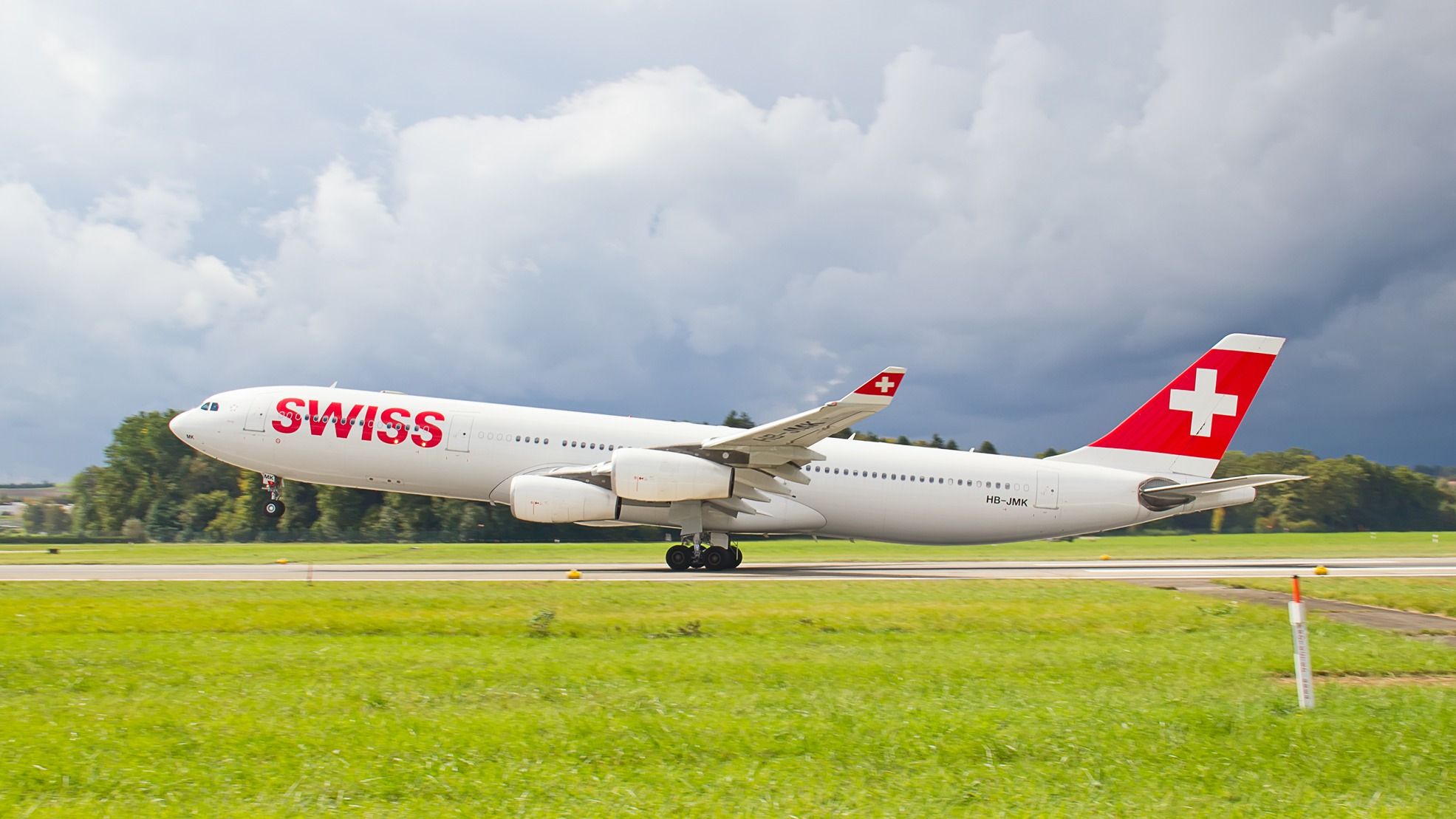 SWISS Airbus A340-300 departing Zurich Airport ZRH shutterstock_218604841