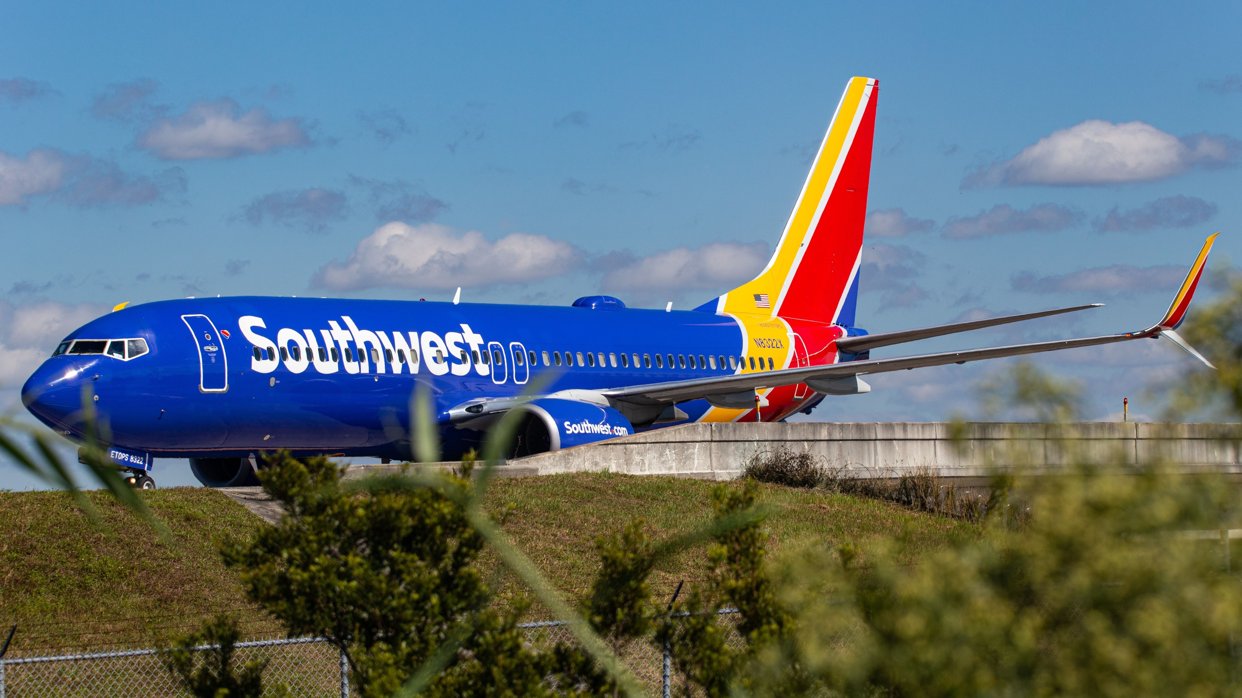 Southwest Airlines Boeing 737-8H4 (N8322X) taxiing at Orlando International Airport.