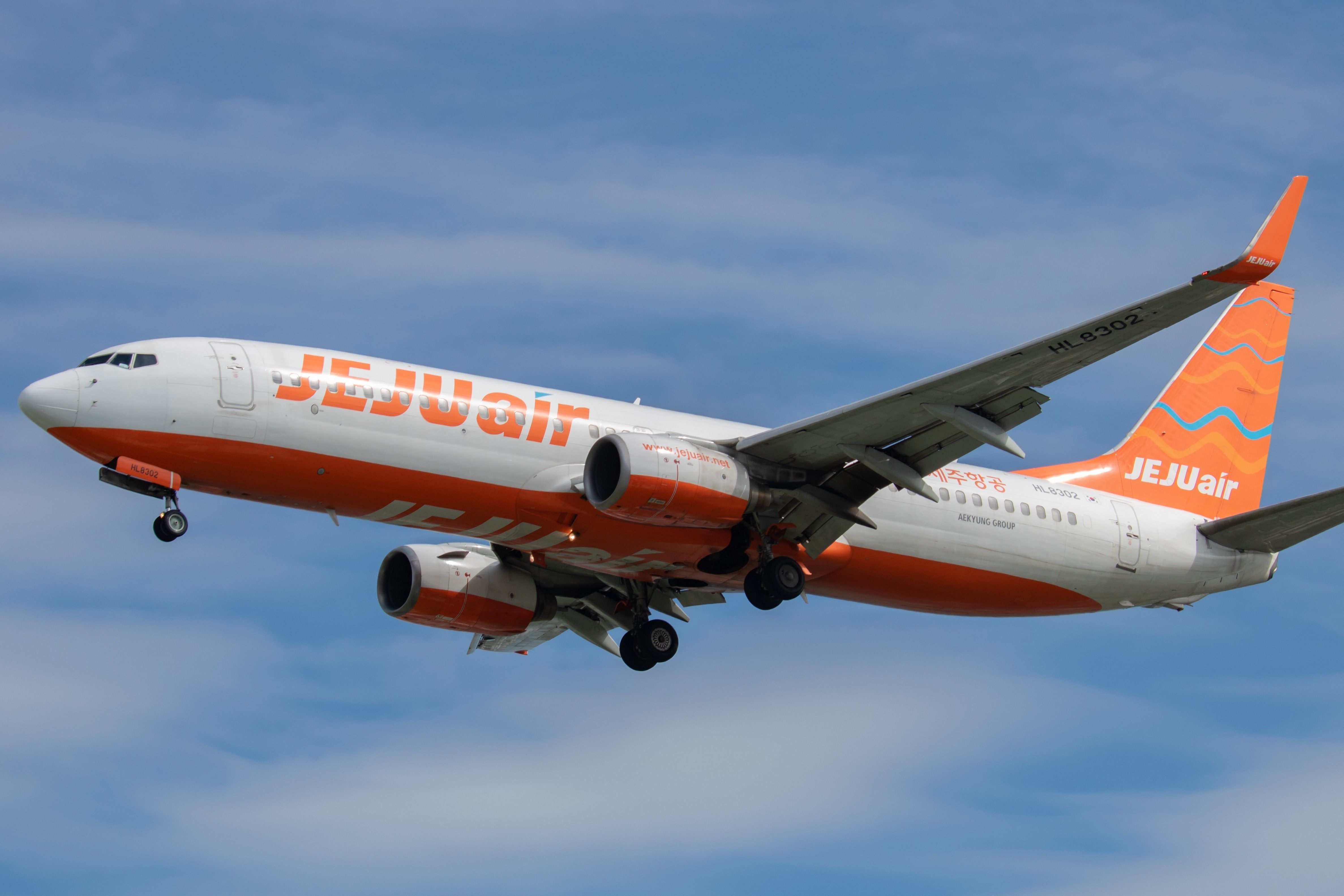 Da Nang city, Viet Nam-02012023: The aircraft Boeing 737-8FH with registration HL8302 of Jeju Air approaching to land at Da Nang international Airport.