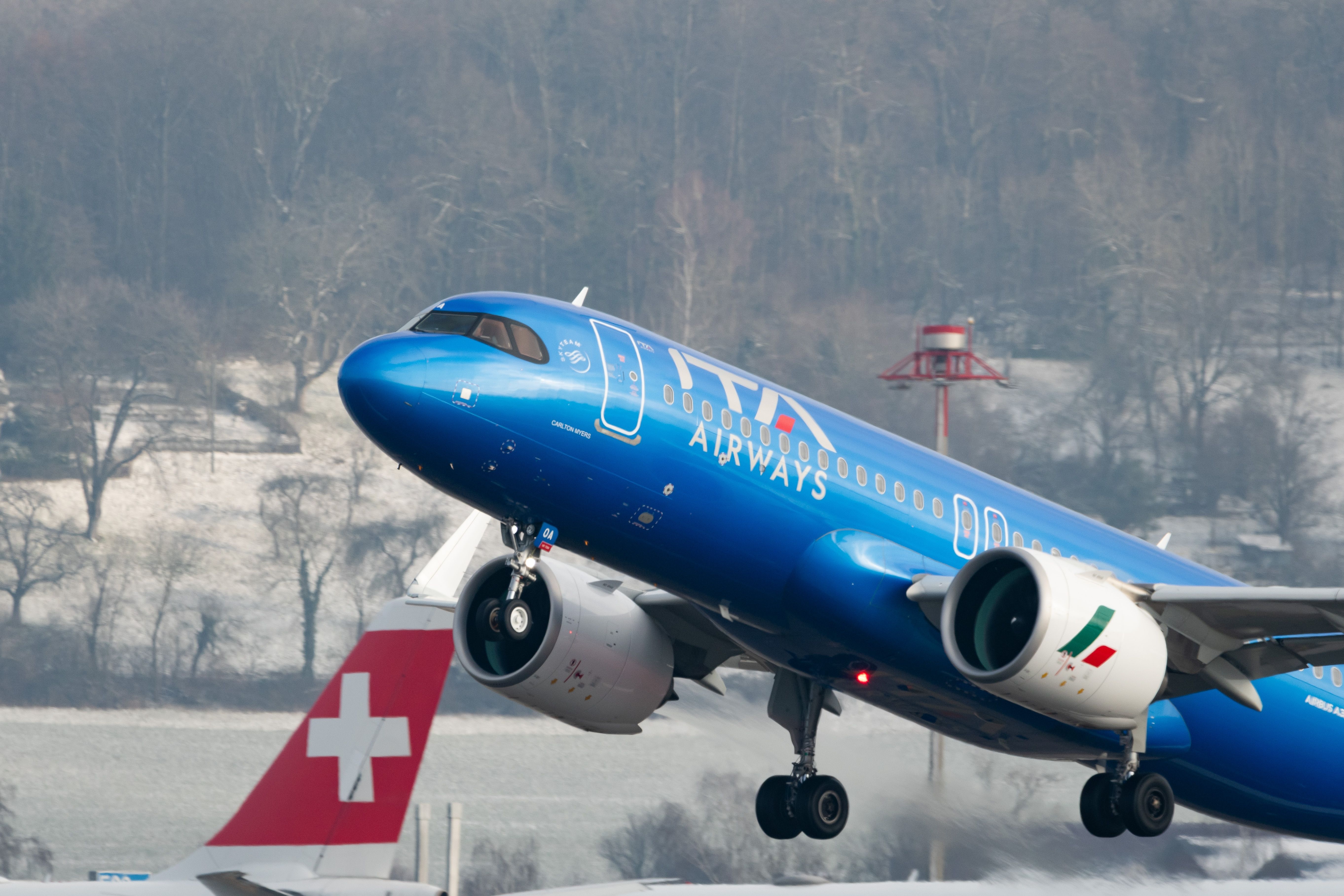 ITA Airways Airbus A320neo departing Zurich Airport ZRH shutterstock_2424609423