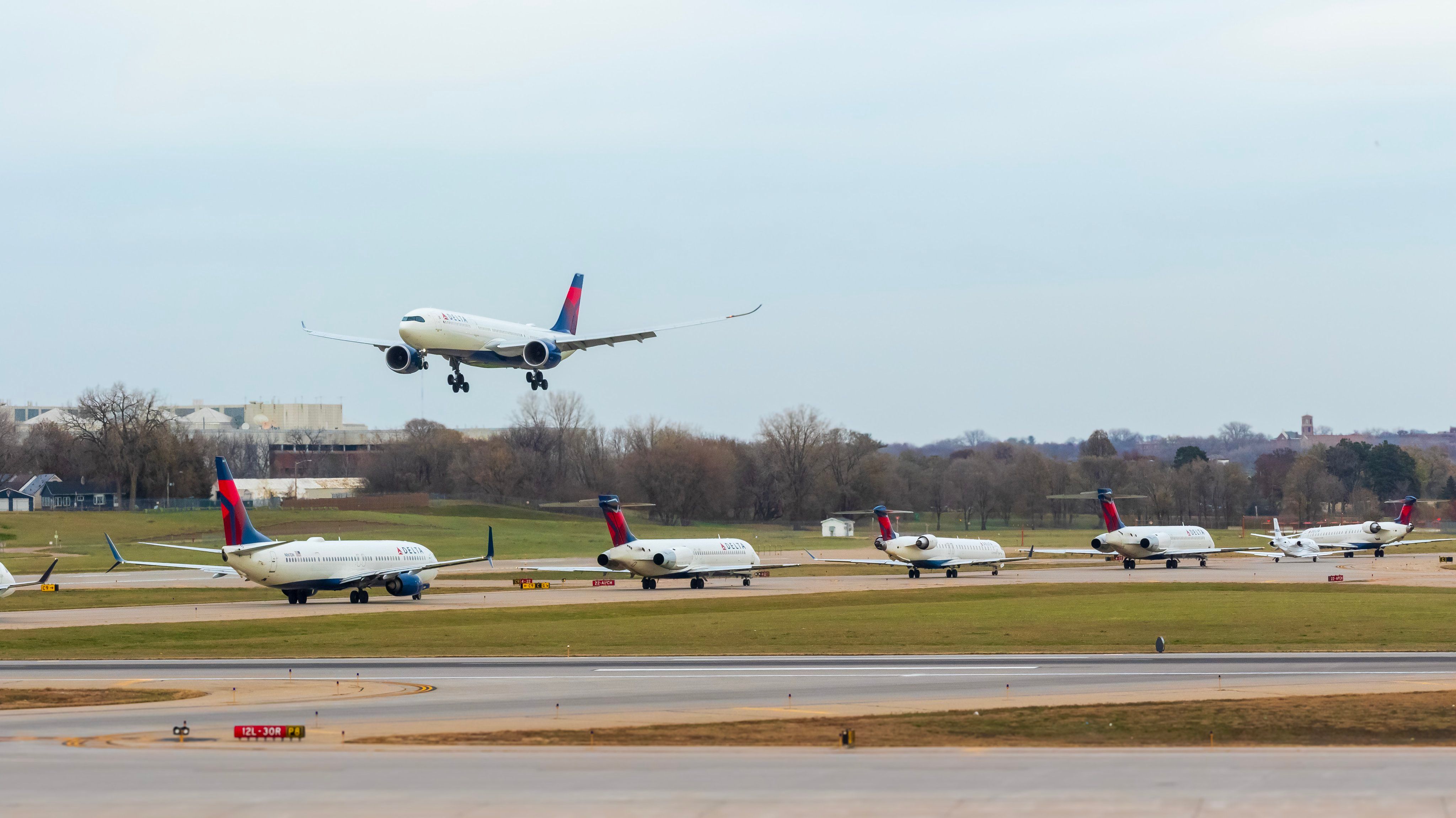 Delta Air Lines Planes lined up at Minneapolis–Saint Paul International Airport.