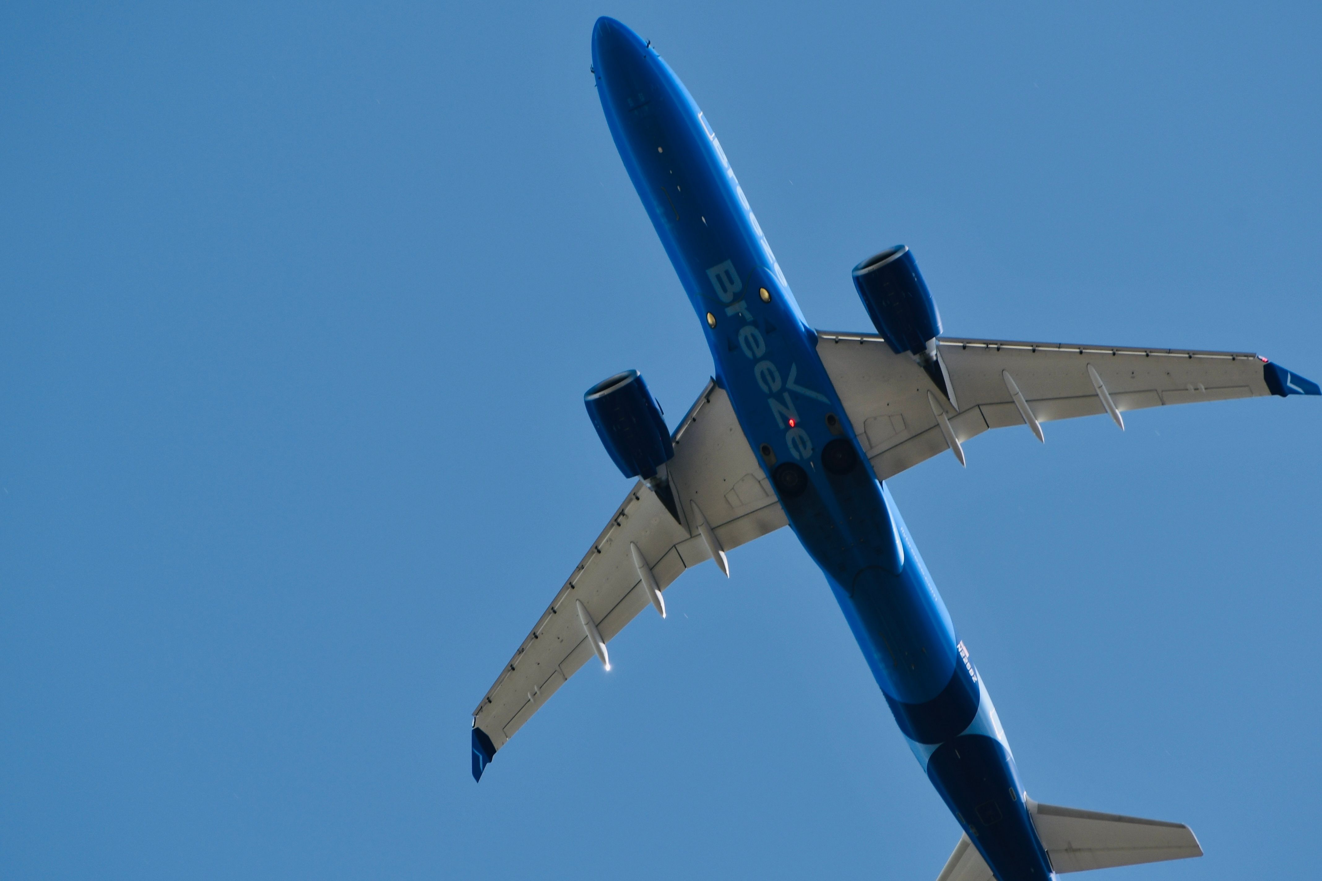 Breeze Airways Airbus A220-300 jet with registration N213BZ shown on final approach into Provo Airport in Saratoga Springs, Utah, USA.