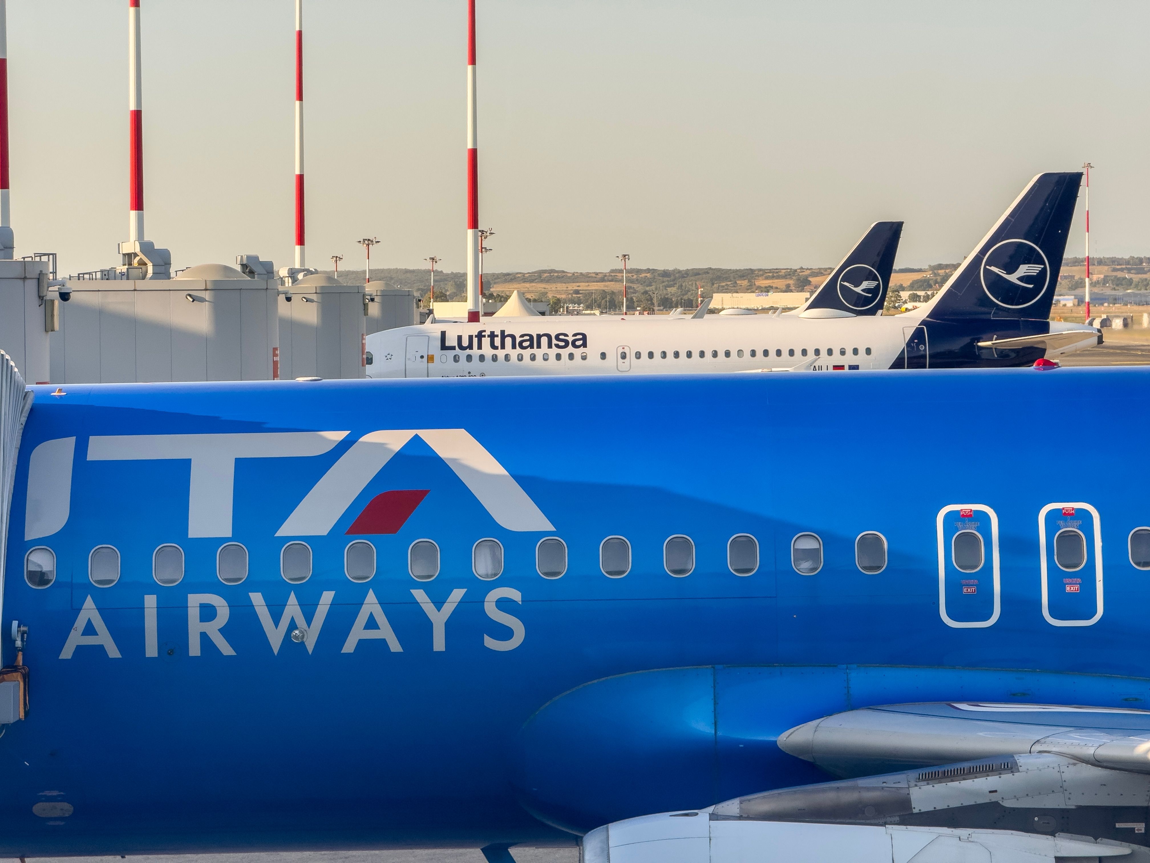 Lufthansa and ITA Airways aircraft at FCO shutterstock_2494340355