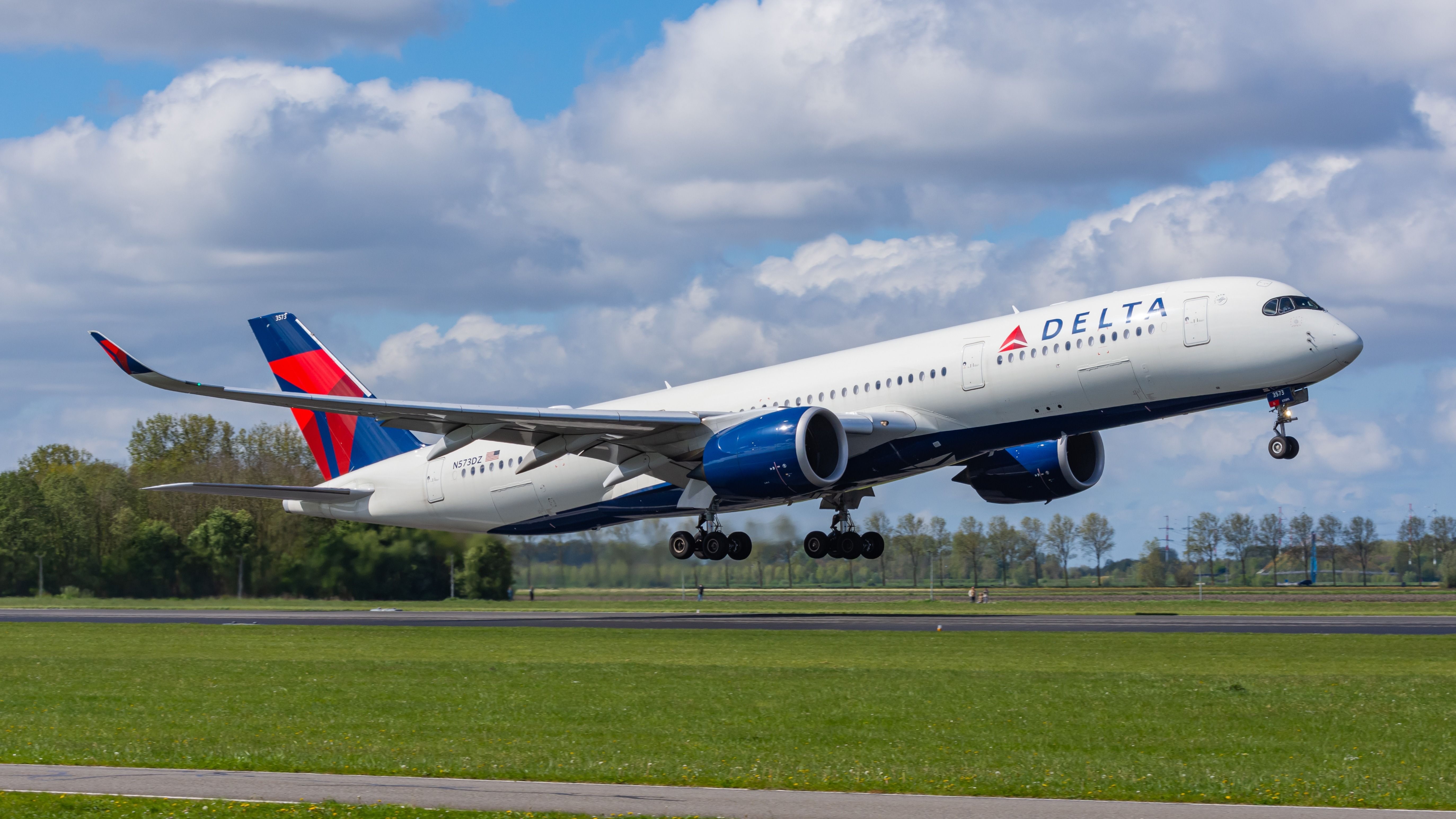 Delta Air Lines Airbus A350-900 departing AMS shutterstock_2466444049
