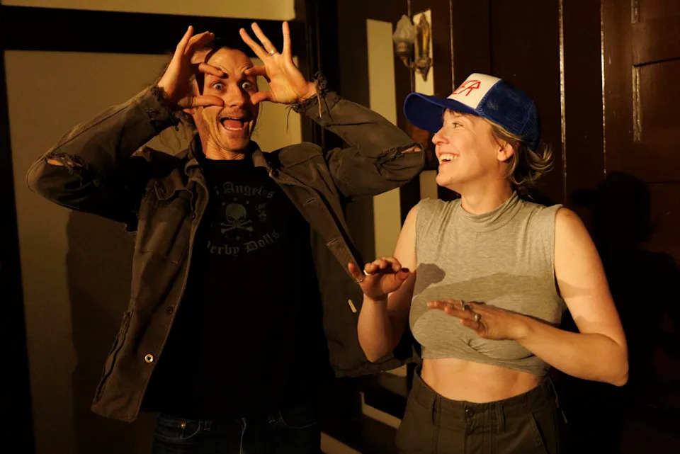 Two friends goof around.