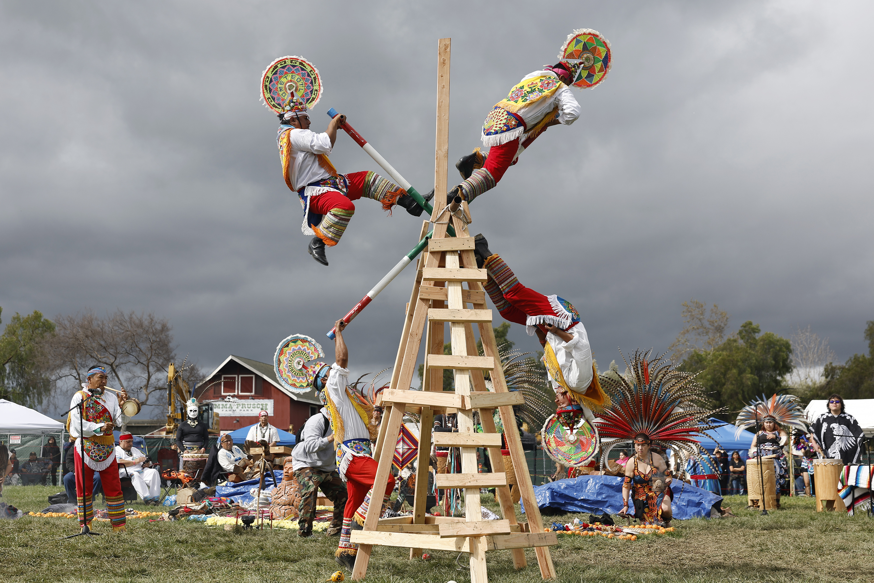 Members from the Huahuas, from Papantla, Veracruz perform the Cruzeta...