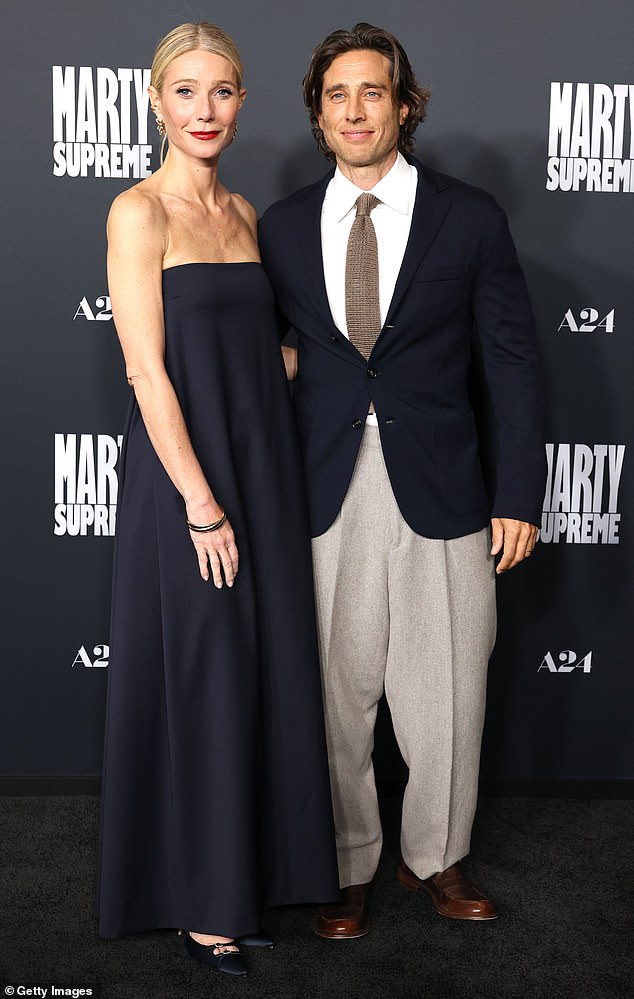 Gwyneth Paltrow pictured in December with her husband Brad Falchuk at the premier of Marty Supreme in Los Angeles on December 8, 2025