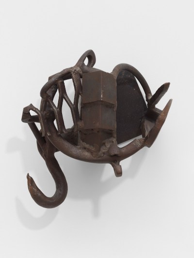 A sculpture of steel hooks welded together.