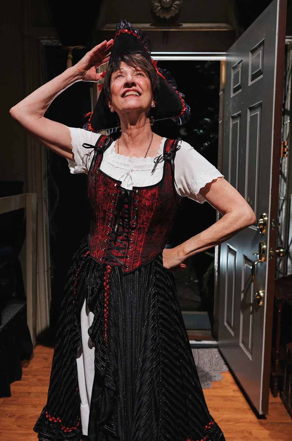 Brenda Barrow (Jan Zvaifler) prepares to lead the Lake Charles Pirate Festival Parade in Central Works' "After Happy," written by Patricia Milton. (Robbie Sweeny/Central Works)