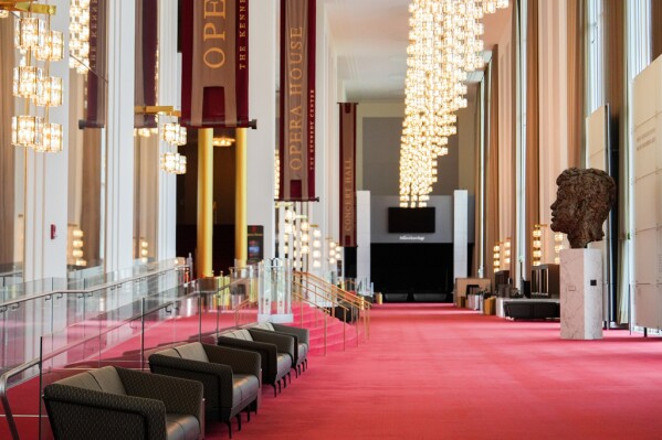 An eight foot tall bronze bust of President John F. Kennedy is seen in the Grand Foyer of the John F. Kennedy Center for the Performing Arts during a media tour to show building damage, Wednesday, April 22, 2026, in Washington. (AP Photo/Julia Demaree Nikhinson)