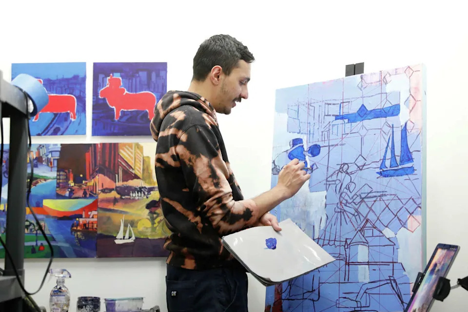 Shrey Purohit, a San Francisco Arts Commission grantee, works on a painting for his grant proposal in his studio at Root Division on Tuesday, May 12, 2026, in San Francisco. (Lea Suzuki/S.F. Chronicle)