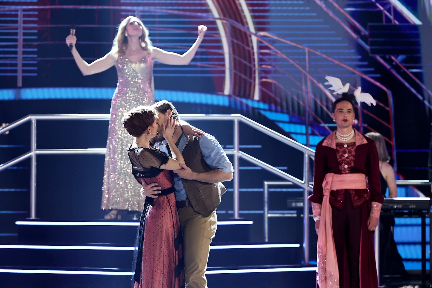 From left: Marla Mindelle, Melissa Barrera, Constantine Rousouli, Jim Parsons and the cast of "Titaníque" performed onstage during the 79th annual Annual Tony Awards at Radio City Music Hall on Sunday in New York City.