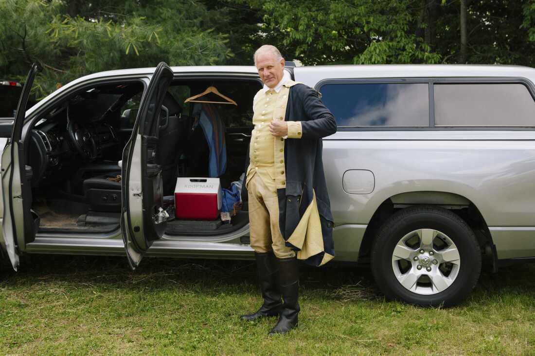 Reenactor John Koopman III gets dressed as George Washington before the event Living History: George Washington’s Encampment at the Thomas Baird Homestead in Millstone Township, New Jersey.