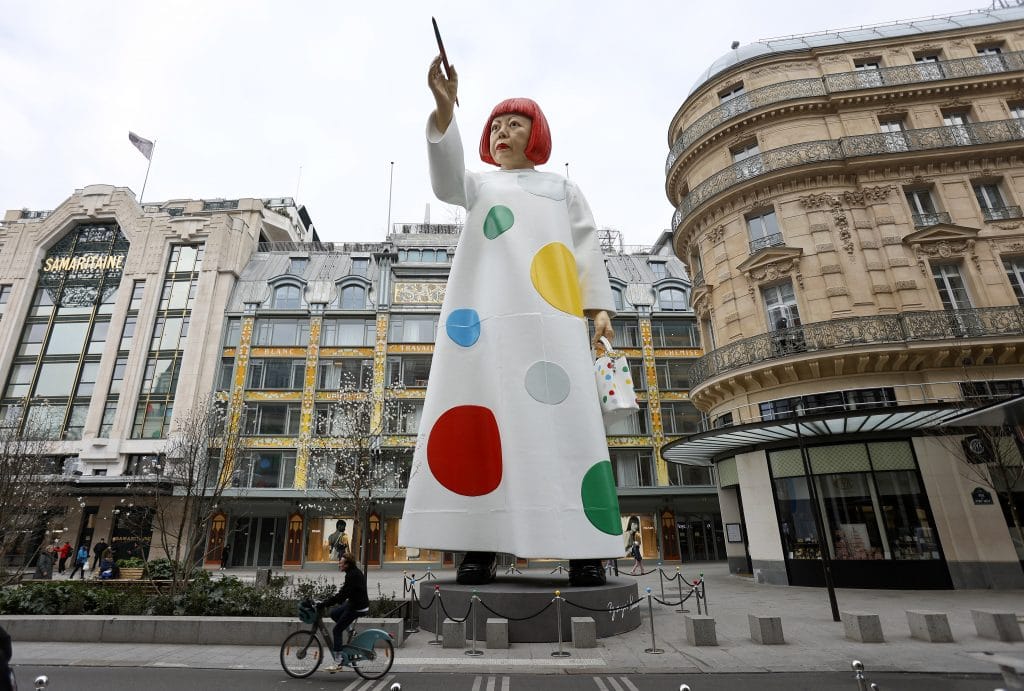 A huge sculpture in the likeness of Yayoi Kusama is erected near the headquarters of the Maison Louis Vuitton