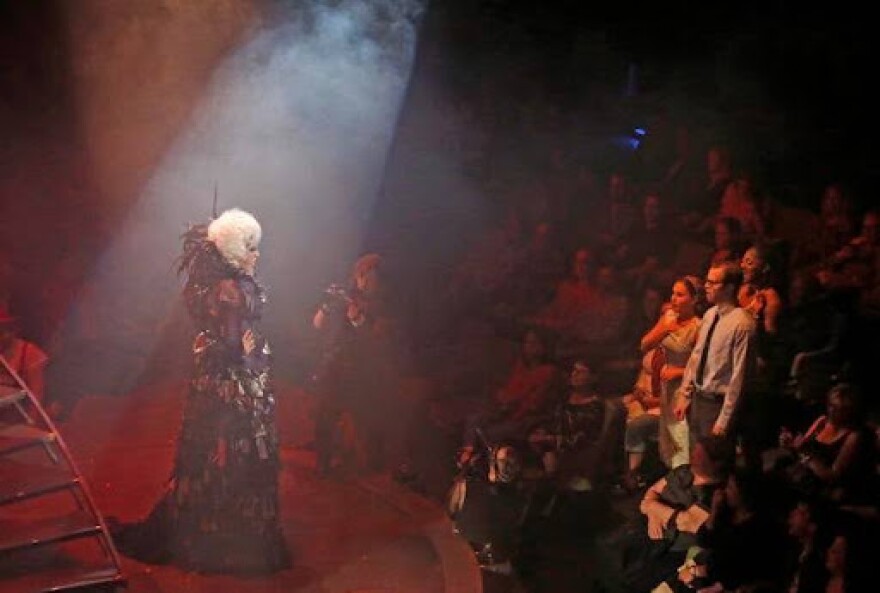 Dan Domenech (left) as "Frank-N-Furter," appears as Brad and Janet, played by Alex Organ and Morgan Mabry Mason, watch during a performance at the Rocky Horror Show, presented by the Dallas Theater Center at the Wyly Theatre at AT&T Performance Center, photographed on Tuesday, September 16, 2014.