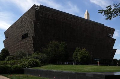 WASHINGTON, DC - AUGUST 28: As the Washington Monument is seen in the background, the National Museum of African American History and Culture on August 28, 2025 in Washington, DC. The Trump Administration will review exhibition contents of 18 Smithsonian museums to reflect “unity, progress, and enduring values that define the American story” ahead of the nation’s 250th anniversary celebrations.  (Photo by Alex Wong/Getty Images)