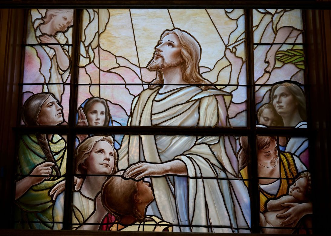 Newly installed stained glass depicting Jesus Christ adorns the temple's entrance building on the north side of Temple Square.