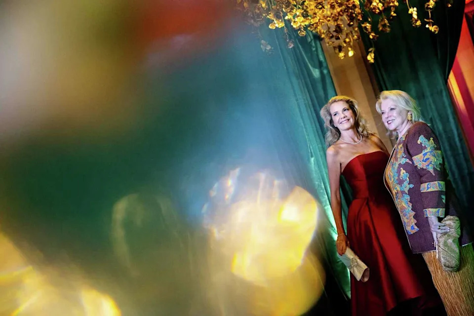 Kelly Grimes, left, and Geanne Lawrence pose for a portrait during the opera season opening ball reception at the City Hall in San Francisco, Sept. 5, 2025. (Manuel Orbegozo/For the S.F. Chronicle)