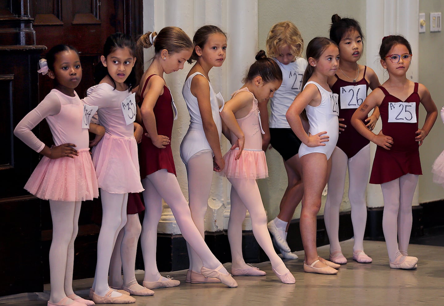A group of dancers took a break after they auditioned.