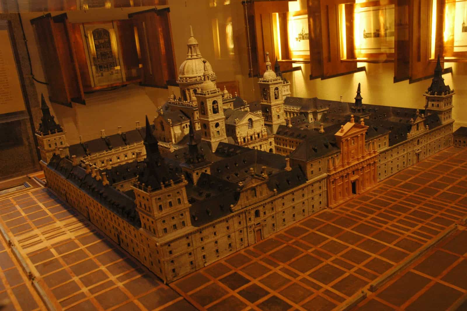 Architectural model showing El Escorial’s vast rectangular complex, towers, courtyards, and central basilica.