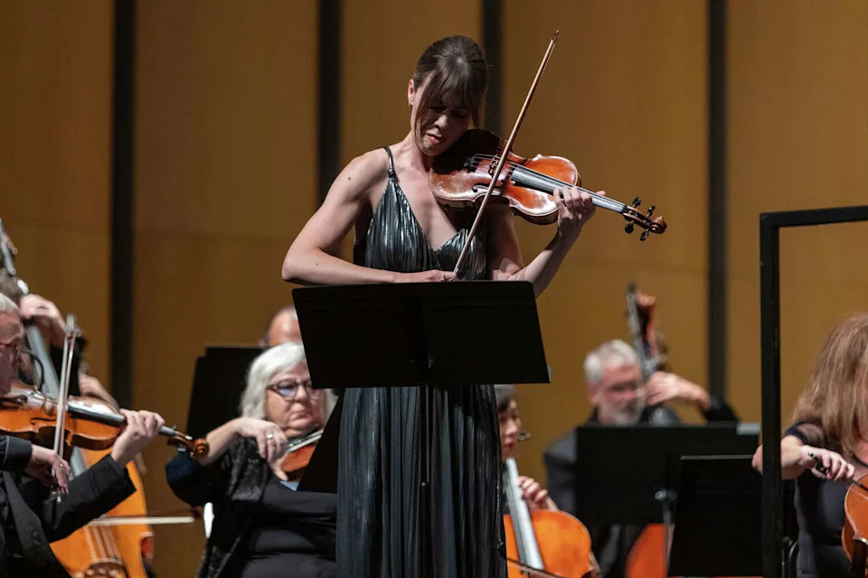 Guest violinist Tessa Lark performs "Sky," a piece composed for her, as part of Harmonium of Texas' debut concert. (Blaine Young/For the Express-News)