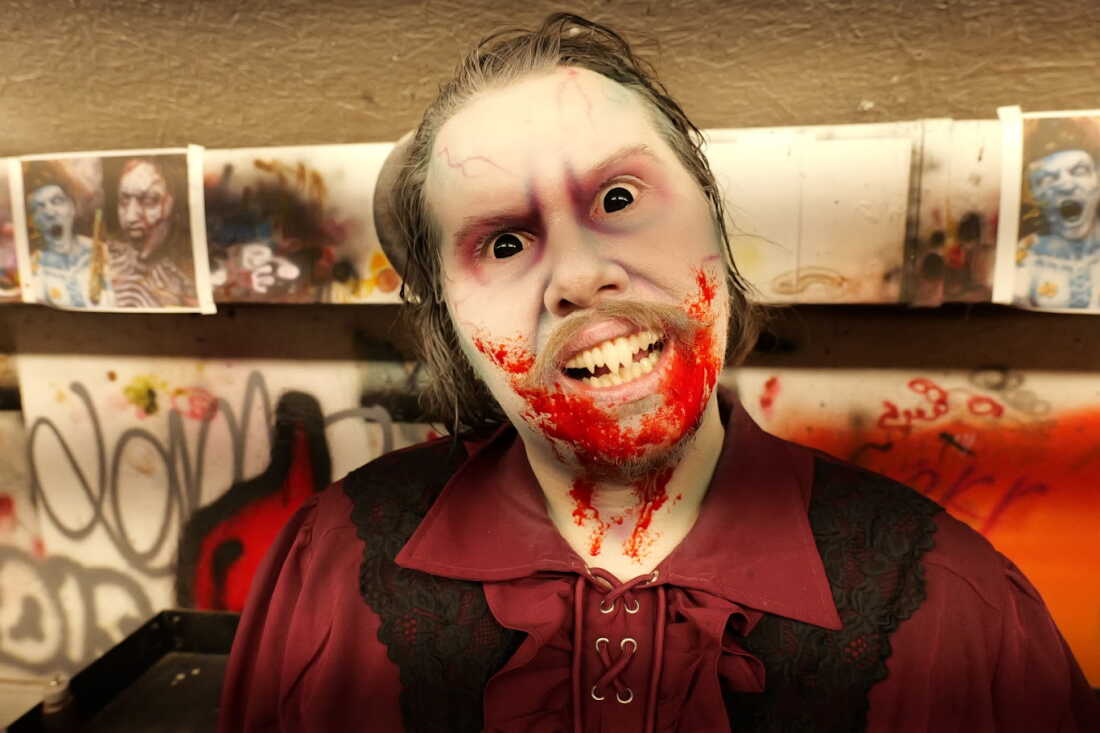 Robert Doyle's finished face of makeup transforms him into a Nosferatu-like vampire.