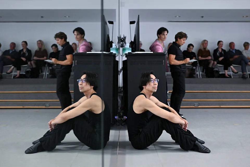 Artistic Director Edwaard Liang watches last week as dancers rehearse his piece "The Art of War." - (Matt McClain/For The Washington Post)
