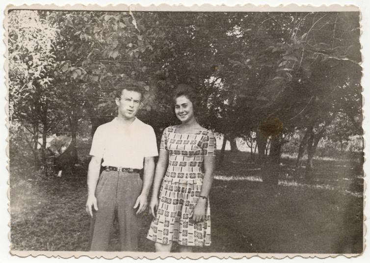 A couple in a black and white photo from the 1970s.